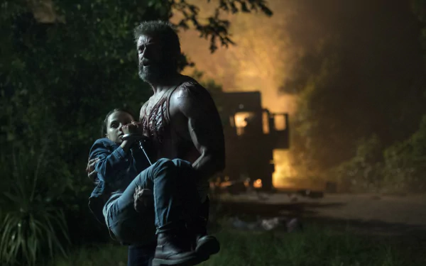 HD desktop wallpaper of the movie Logan featuring Hugh Jackman as Wolverine carrying Dafne Keen as Laura Kinney (X-23), with a dramatic night-time background.