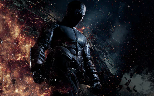 HD PC desktop wallpaper/background: Rendel from the movie — a dark armored vigilante silhouetted against fiery explosions and swirling debris.