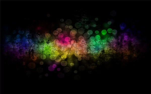 HD PC desktop wallpaper featuring a colorful, grunge-inspired artistic design with vibrant, blurred lights against a dark background.