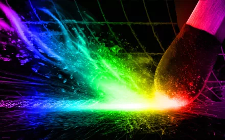 Artistic HD wallpaper featuring a burst of vibrant colors radiating from a striking match, creating a dynamic and colorful background.