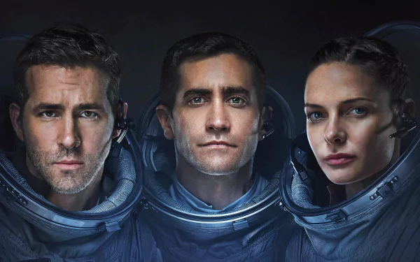 HD wallpaper of the movie Life (2017) featuring Ryan Reynolds, Jake Gyllenhaal, and Rebecca Ferguson in astronaut suits.