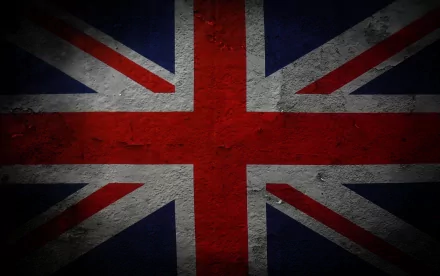 HD desktop wallpaper featuring the Union Jack, showcasing its distinctive red, white, and blue colors against a textured, dark backdrop.