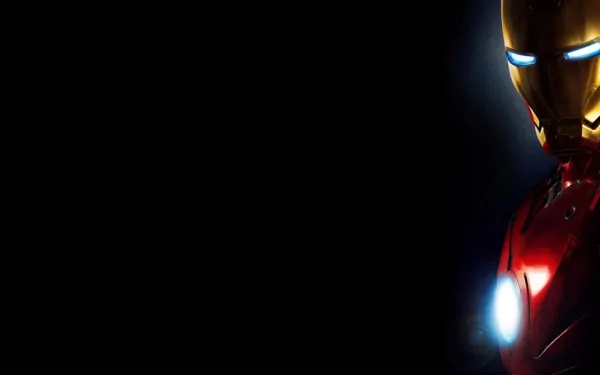 HD desktop wallpaper of Iron Man, featuring his illuminated armor against a dark background.