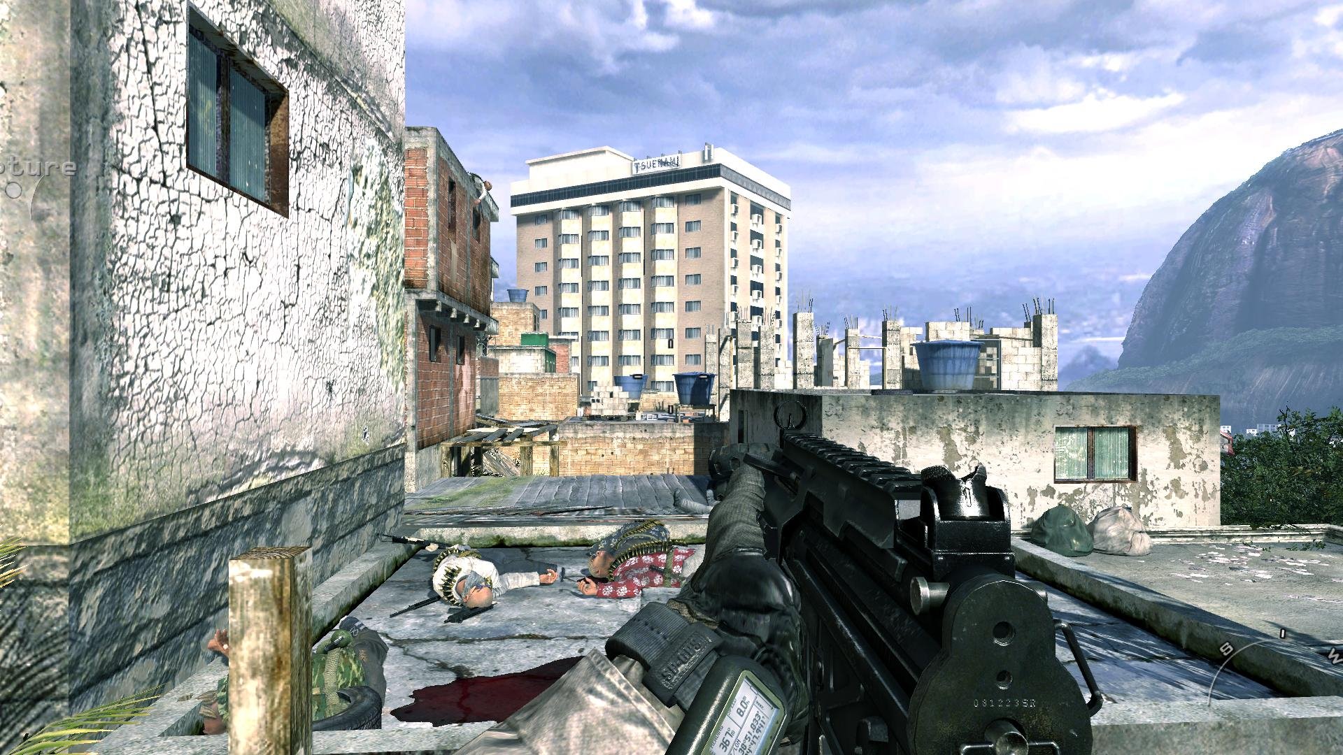 HD PC desktop wallpaper featuring a first-person view of a gun in an urban combat scene from Call of Duty 4: Modern Warfare video game.