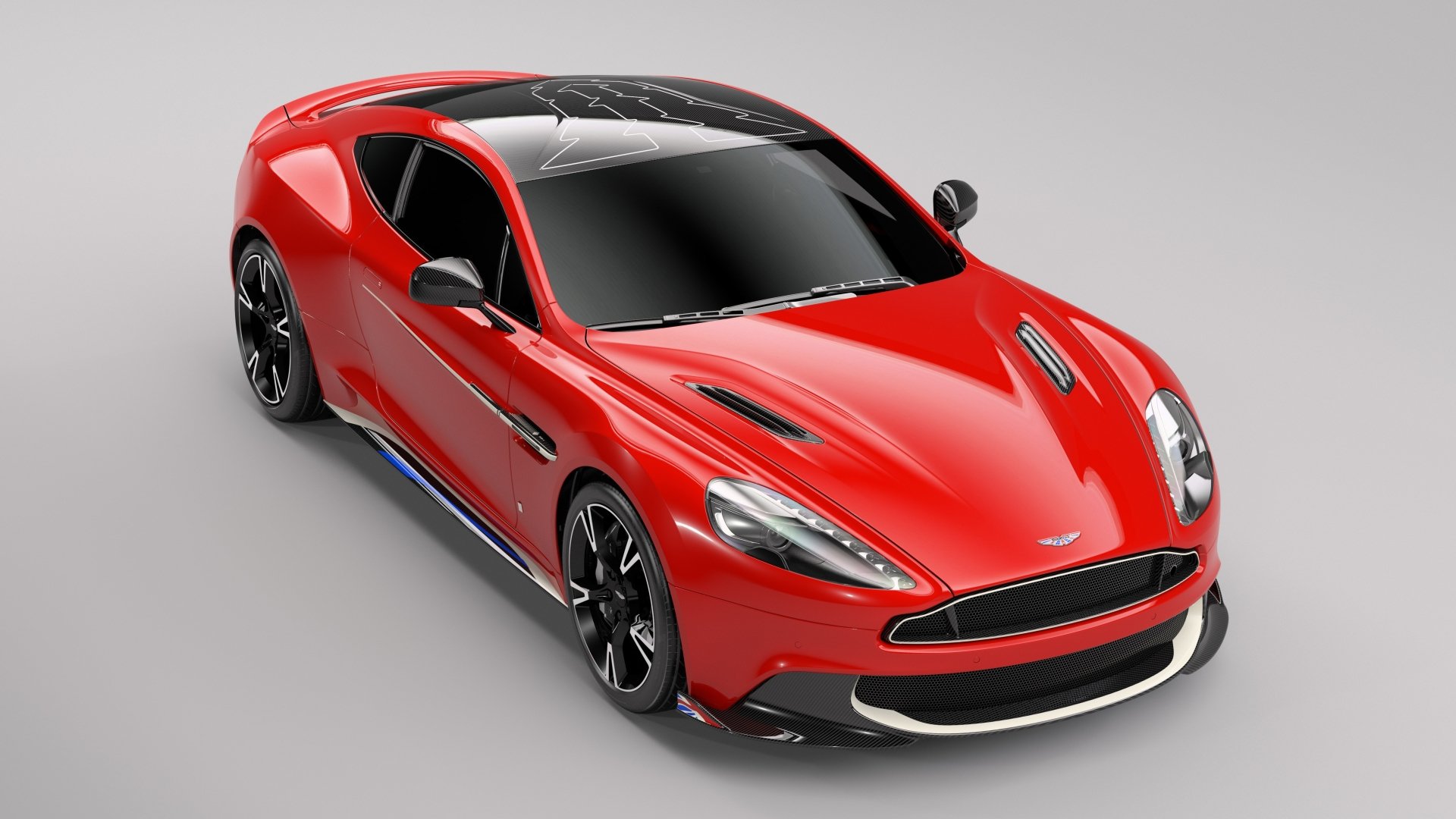Red Aston Martin Vanquish supercar on a neutral background — 5K Ultra HD PC desktop wallpaper showcasing the sleek performance vehicle.