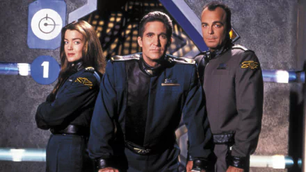 HD desktop wallpaper featuring Jeffery Sinclair, Susan Ivanova, and Michael Garibaldi from the TV show Babylon 5, posed in their distinctive uniforms.