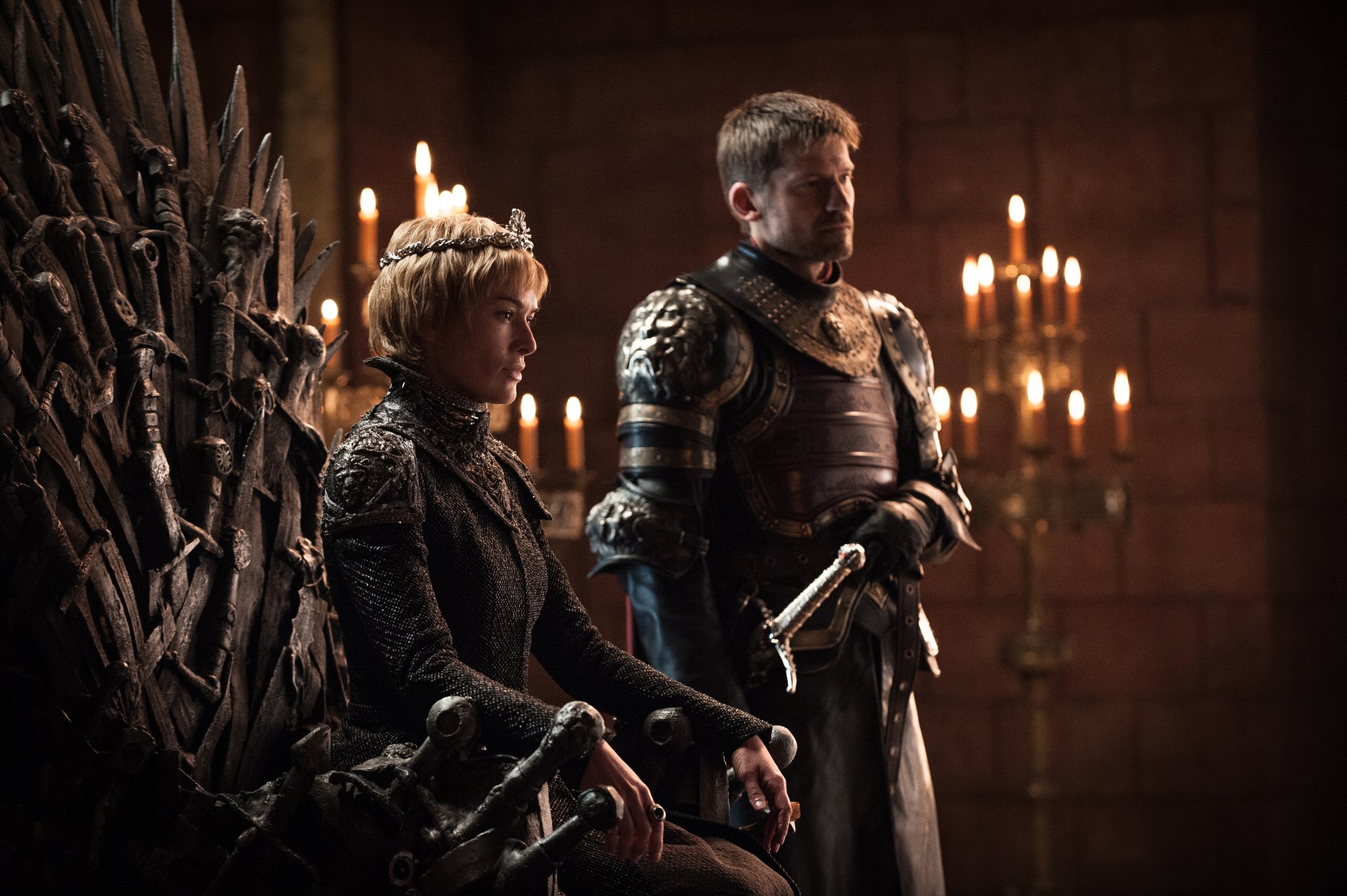 4K Ultra HD wallpaper featuring Lena Headey as Cersei Lannister seated on the Iron Throne and Nikolaj Coster-Waldau as Jaime Lannister from the TV show Game of Thrones.