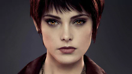 HD desktop wallpaper featuring a character from The Twilight Saga: Breaking Dawn - Part 2 with a serious expression. Tagged as Twilight (Movie).