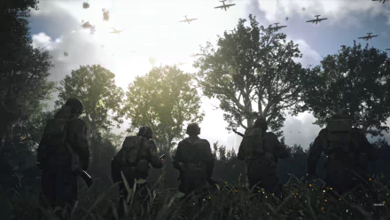HD desktop wallpaper depicting a scene from Call of Duty: WWII, showcasing World War II soldiers in a forest as aircraft fly overhead.