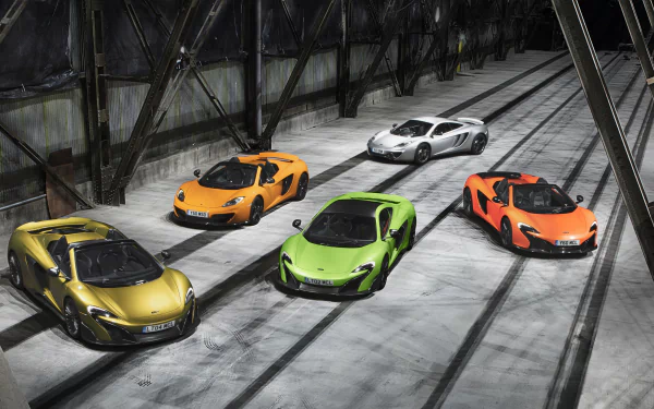 A lineup of vibrant McLaren supercars including the 675LT, 650S, and 12C showcased in a high-resolution 4K Ultra HD desktop wallpaper.