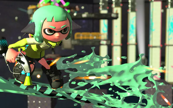 A HD desktop wallpaper featuring an Inkling from the video game Splatoon 2. The Inkling, with green hair and a focused expression, is mid-action, splashing green ink across an urban environment.