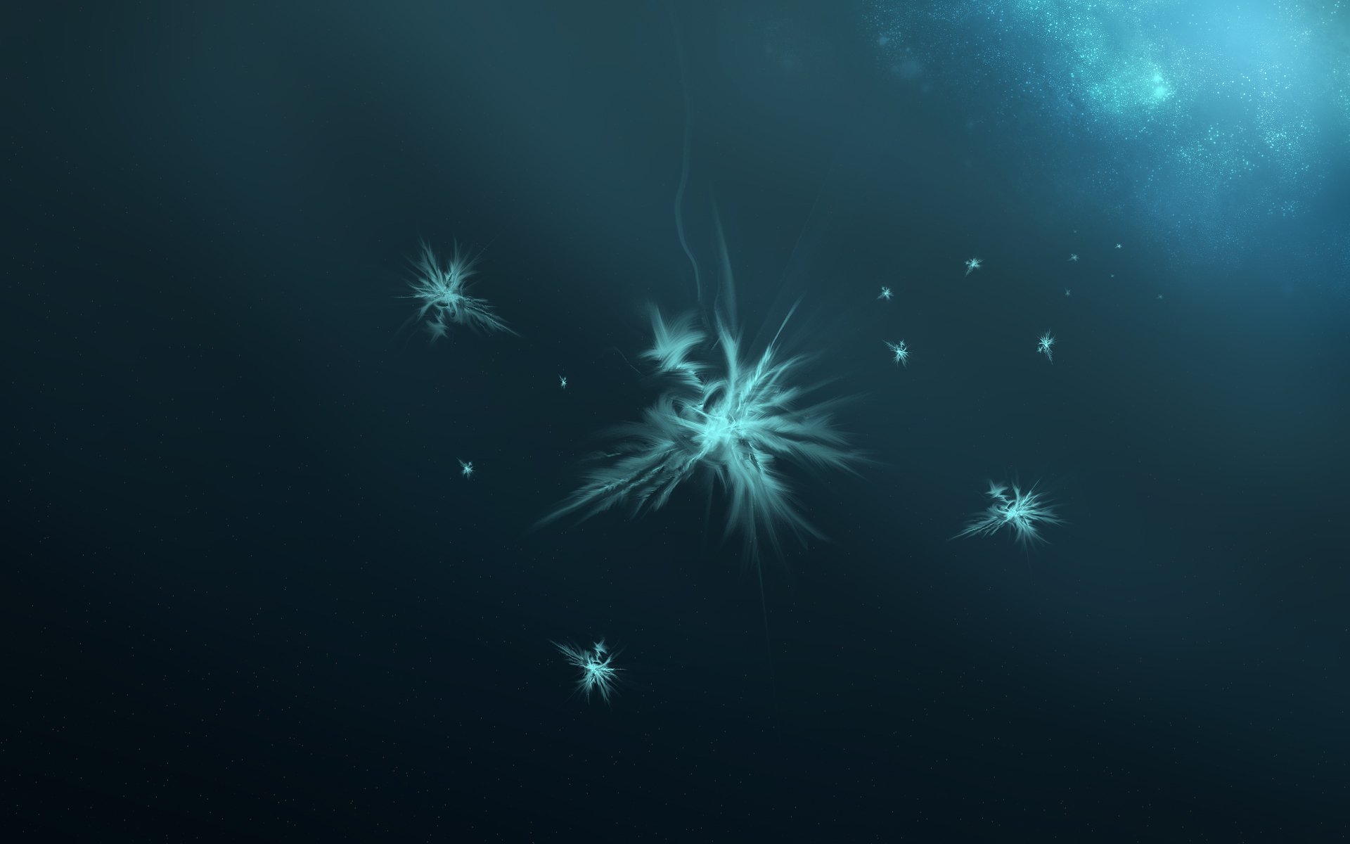 Abstract blue fractal shapes with textured, glowing elements float against a dark background in this high-definition CGI desktop wallpaper.