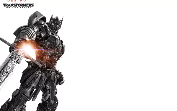 HD desktop wallpaper of Optimus Prime from the movie Transformers: The Last Knight, featuring the character standing with a sword against a bright backdrop.
