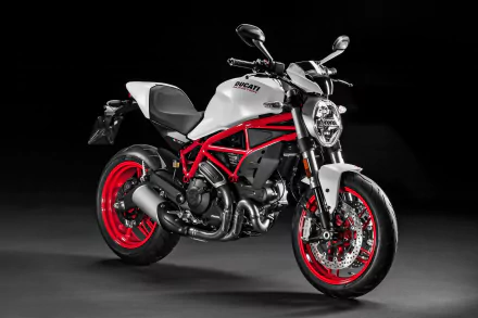 White-and-red Ducati Monster vehicle (motorcycle) on a black backdrop, 4K Ultra HD PC desktop wallpaper.