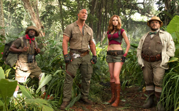 HD desktop wallpaper of Jack Black, Kevin Hart, Karen Gillan, and Dwayne Johnson in a jungle scene from the movie Jumanji: Welcome to the Jungle.