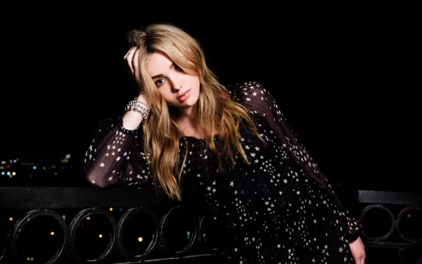 American blonde actress Peyton List poses against a dark night background in this 4K Ultra HD PC desktop wallpaper.