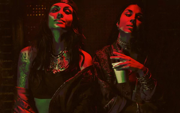 HD PC desktop wallpaper featuring the electronic music duo Krewella in moody red and green lighting, highlighting their intense and edgy style.