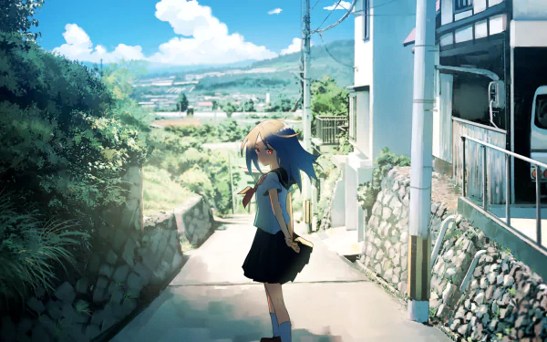 Anime original HD PC desktop wallpaper/background — a schoolgirl in uniform stands on a sunlit hillside street, looking toward green fields and a bright blue sky with fluffy clouds.
