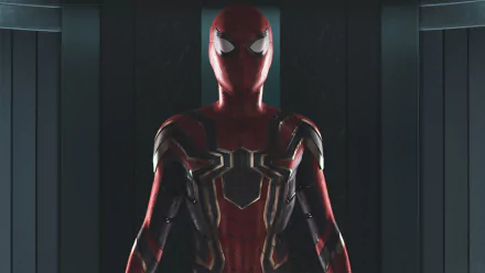 HD desktop wallpaper featuring Spider-Man in his suit from Avengers: Infinity War, also related to Spider-Man: Homecoming, standing in a dark, sleek environment.