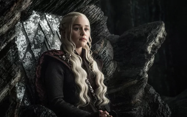HD PC desktop wallpaper featuring Emilia Clarke as Daenerys Targaryen from the TV show Game of Thrones, seated on the Iron Throne in a dark, dramatic setting.
