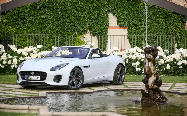  Jaguar F-Type next to a Fountain