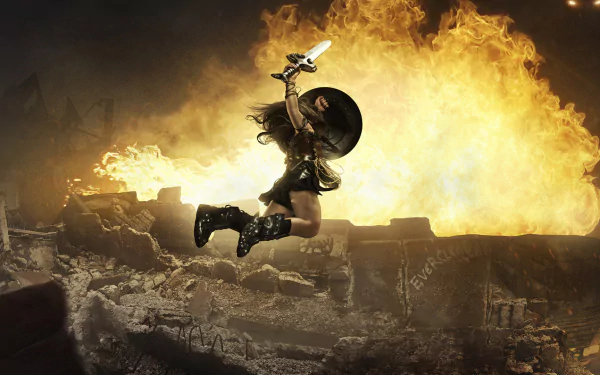 HD desktop wallpaper featuring Wonder Woman leaping with a sword and shield amid an explosive background.
