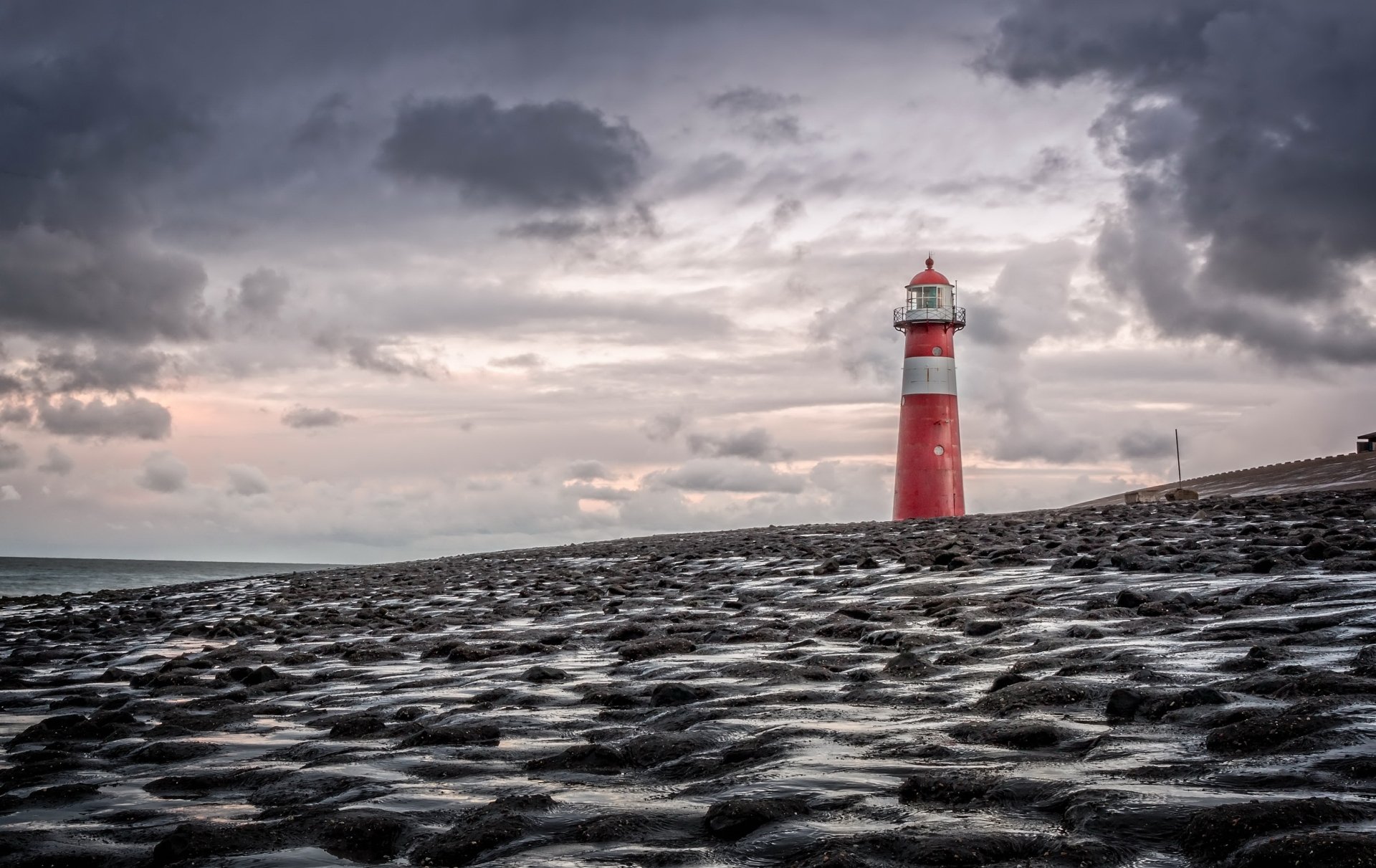 4K Ultra HD Lighthouse Standing Tall Against Stormy Skies and Horizon ...