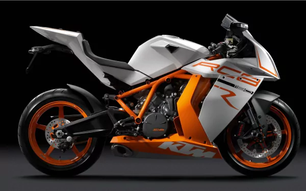 A sleek KTM RC8 motorcycle in white and orange, showcased against a black background as an HD PC desktop wallpaper and background.