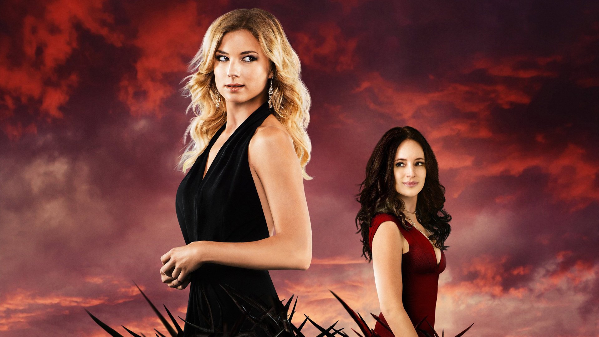 2K Quad HD PC desktop wallpaper of TV show Revenge: two women against a stormy red sky, one in black foreground and one in red behind, ominous thorns at their feet.