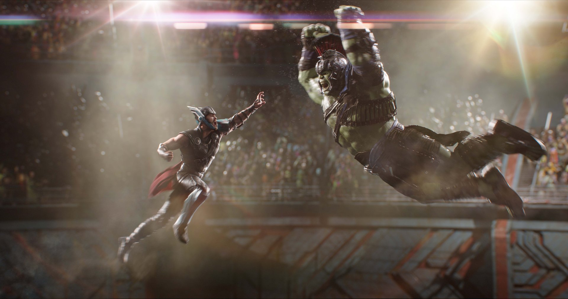 HD wallpaper featuring Chris Hemsworth as Thor and Mark Ruffalo as Hulk in an action-packed scene from the movie Thor: Ragnarok, with Thor and the Hulk mid-fight in an arena.