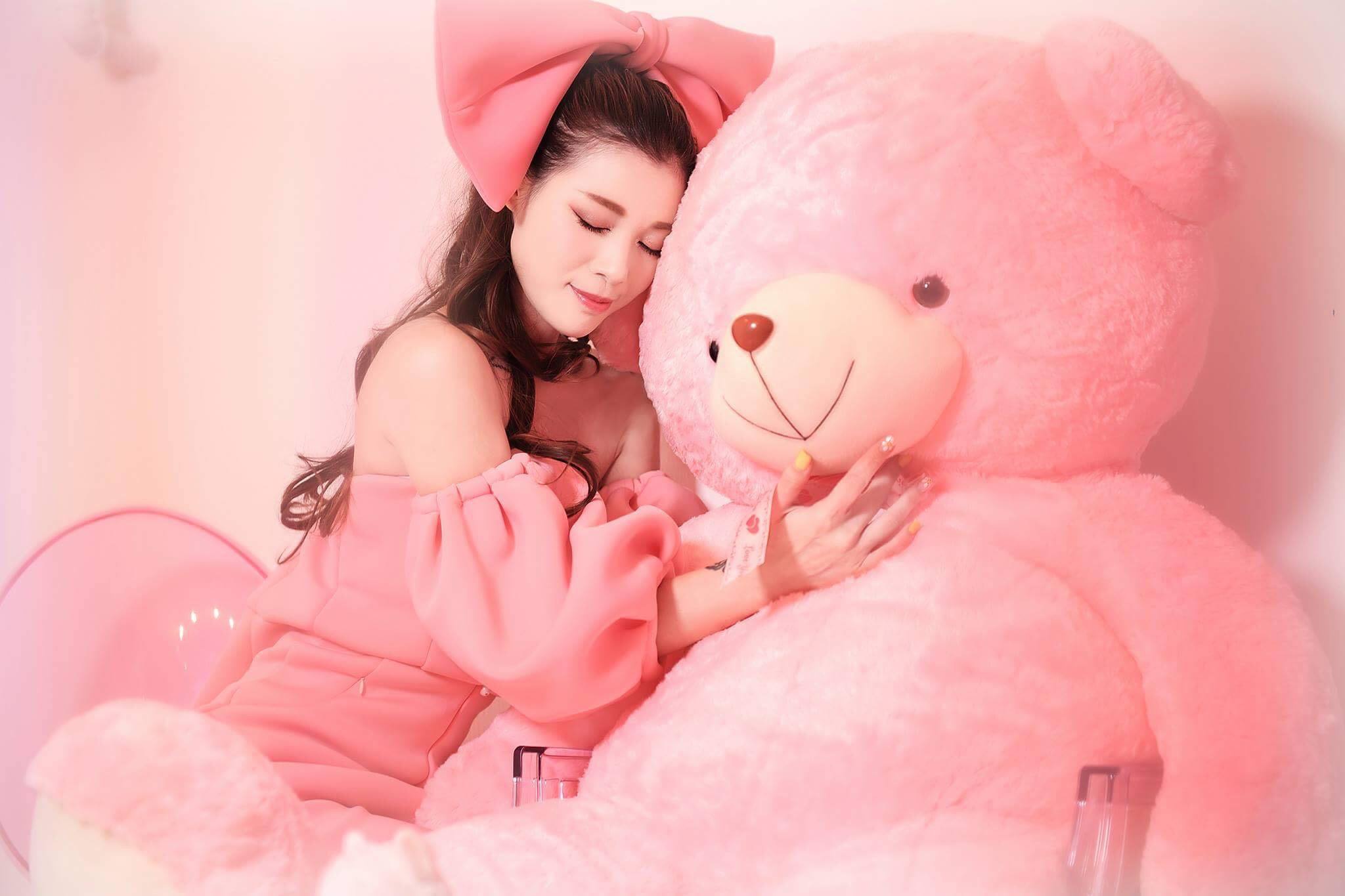 women with teddy bears