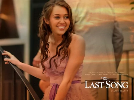 A vibrant HD wallpaper featuring a joyful scene from the romantic movie The Last Song (2010), showcasing a young woman in a beautiful dress, capturing a moment of happiness.