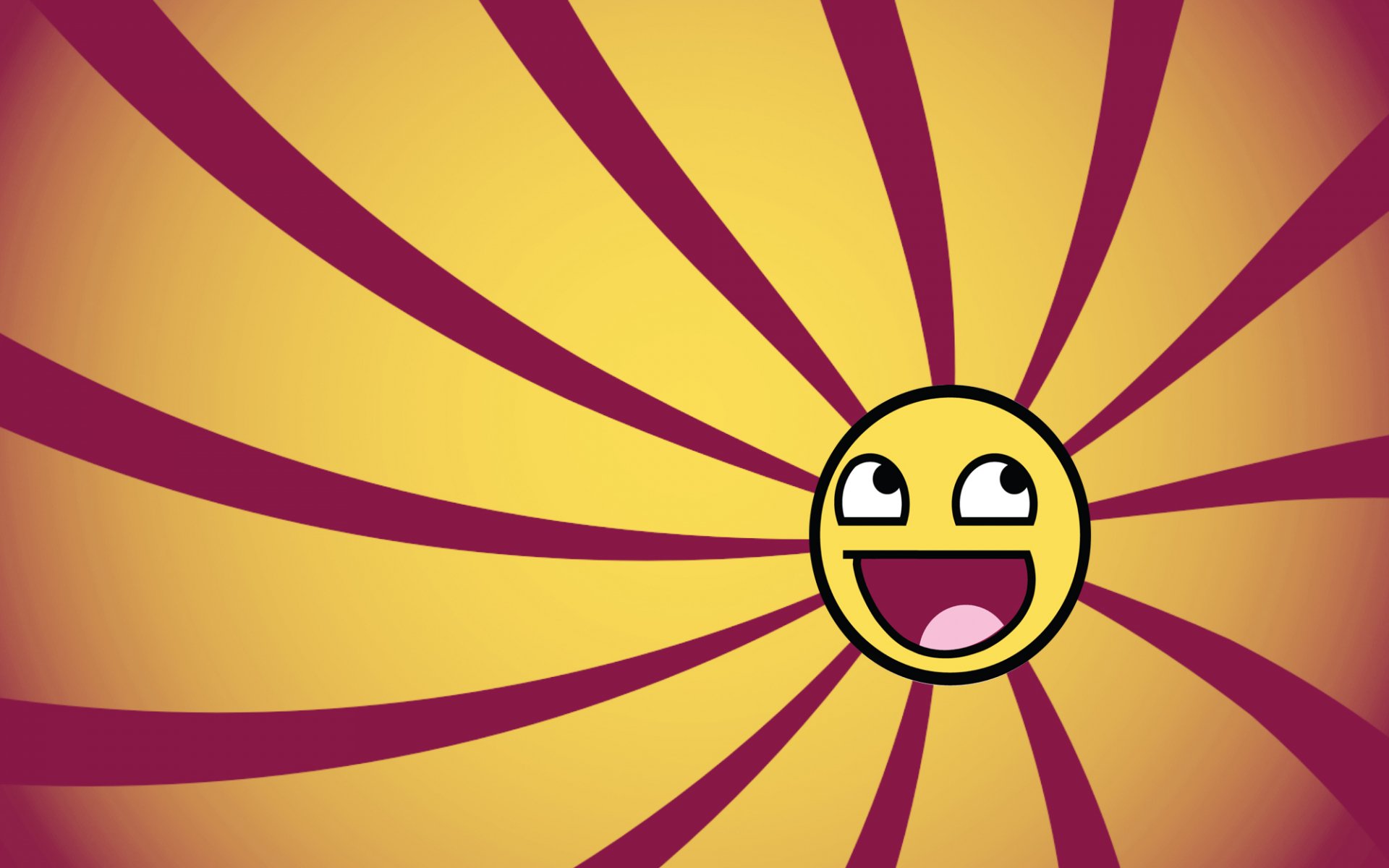 Funny smiley face with a wide grin centered on yellow-and-maroon spiral rays — HD PC desktop wallpaper and background.