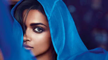 HD desktop wallpaper featuring Indian actress Deepika Padukone with a blue veil partially covering her face.