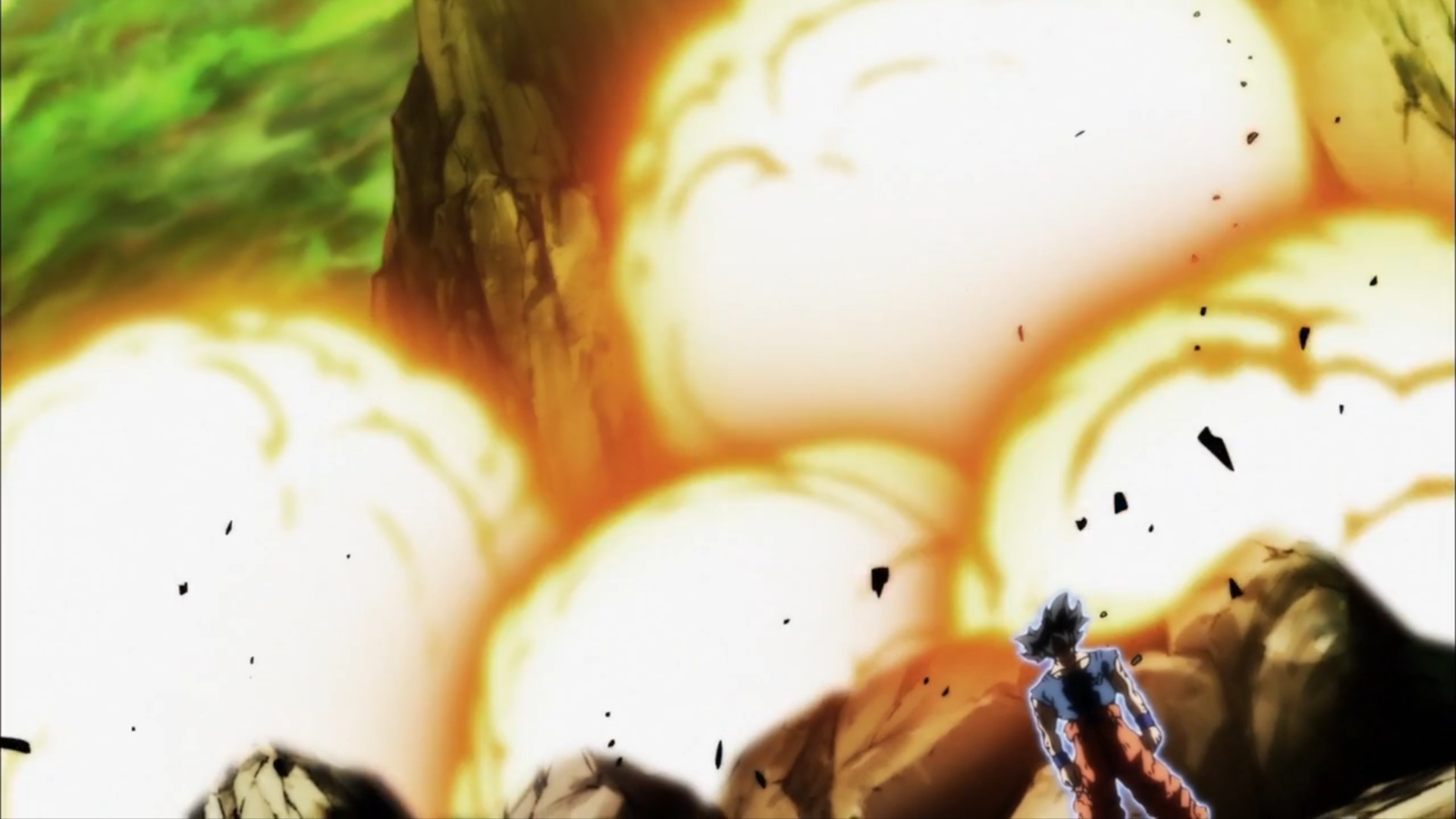 HD desktop wallpaper featuring Goku in his Ultra Instinct form facing a massive explosion in the Dragon Ball Super anime.