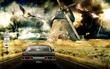 A Chevrolet Impala drives down a desolate road, framed by a dramatic landscape featuring a windmill, dark clouds, and stormy skies, creating an artistic and atmospheric HD wallpaper.