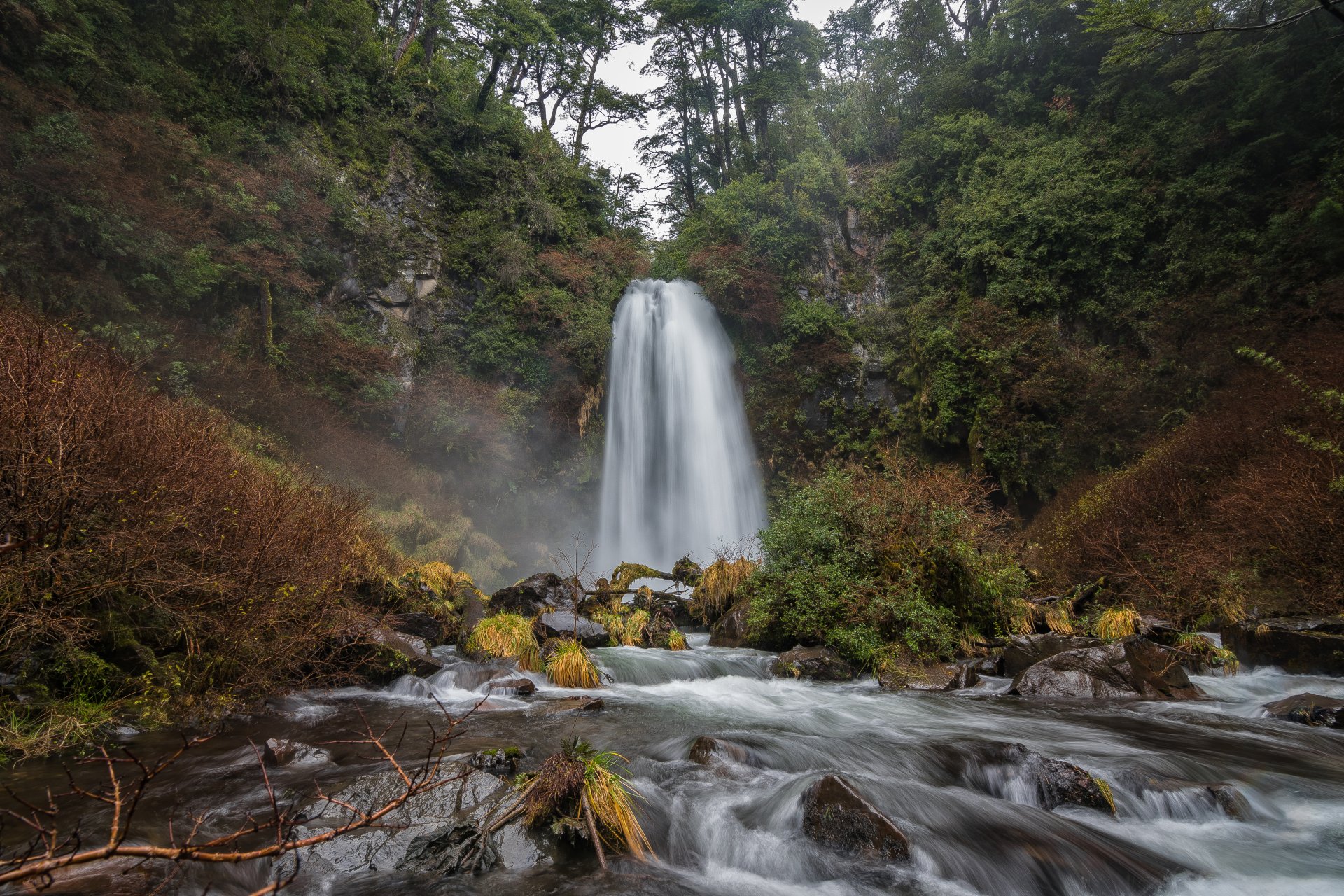 Waterfall in Autumn Forest by Marco Sepulveda