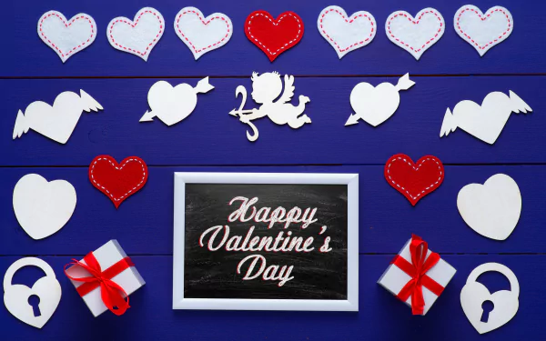 4K Ultra HD Valentine's Day wallpaper featuring love-themed cutouts, red and white hearts, gift boxes, and a framed Happy Valentine's Day message on a blue wooden background.