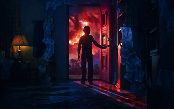 HD wallpaper from Stranger Things Season 2 featuring Noah Schnapp as Will Byers, standing in a doorway with ominous red skies behind him.