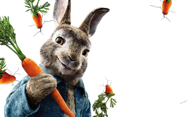 4K Ultra HD PC desktop wallpaper featuring Peter Rabbit holding a carrot, surrounded by floating carrots, inspired by the movie character.