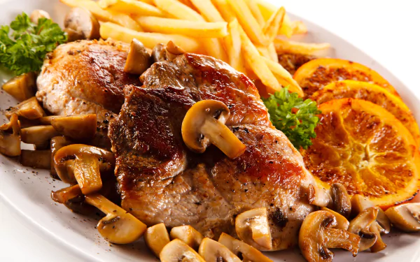 A 4K Ultra HD close-up of a meal featuring grilled meat topped with mushrooms, served with french fries, sautéed mushrooms, orange slices, and a garnish of parsley.
