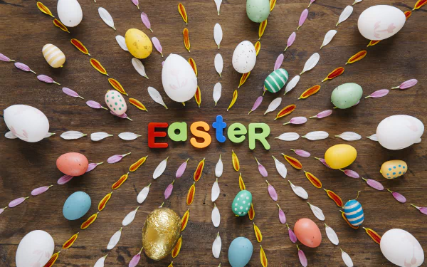 Colorful Easter eggs arranged in a radial pattern around the word Easter on a wooden background, designed as a 4K Ultra HD holiday desktop wallpaper.