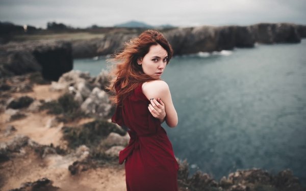 Women Model Redhead Long Hair Brown Eyes Red Dress Cliff Sea Ocean Depth Of Field HD Wallpaper | Background Image