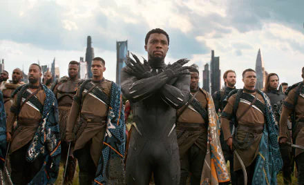 HD PC desktop wallpaper featuring Winston Duke as M'Baku from Avengers: Infinity War, surrounded by his warriors in Wakandan attire, alongside themes of Captain America and Winter Soldier.