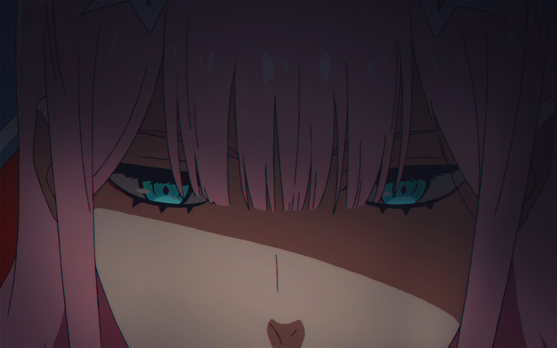 A close-up HD wallpaper featuring Zero Two from the anime Darling in the FranXX, showcasing her intense blue eyes and pink hair.