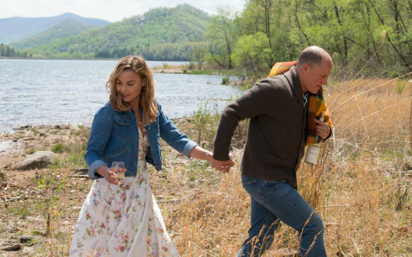 HD wallpaper of a scene from Three Billboards Outside Ebbing, Missouri, featuring two actors by a lakeside.