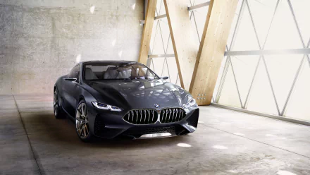 BMW Concept 8 Series: sleek dark BMW 8 Series concept car parked in a sunlit industrial loft — 4K Ultra HD PC desktop wallpaper/background.