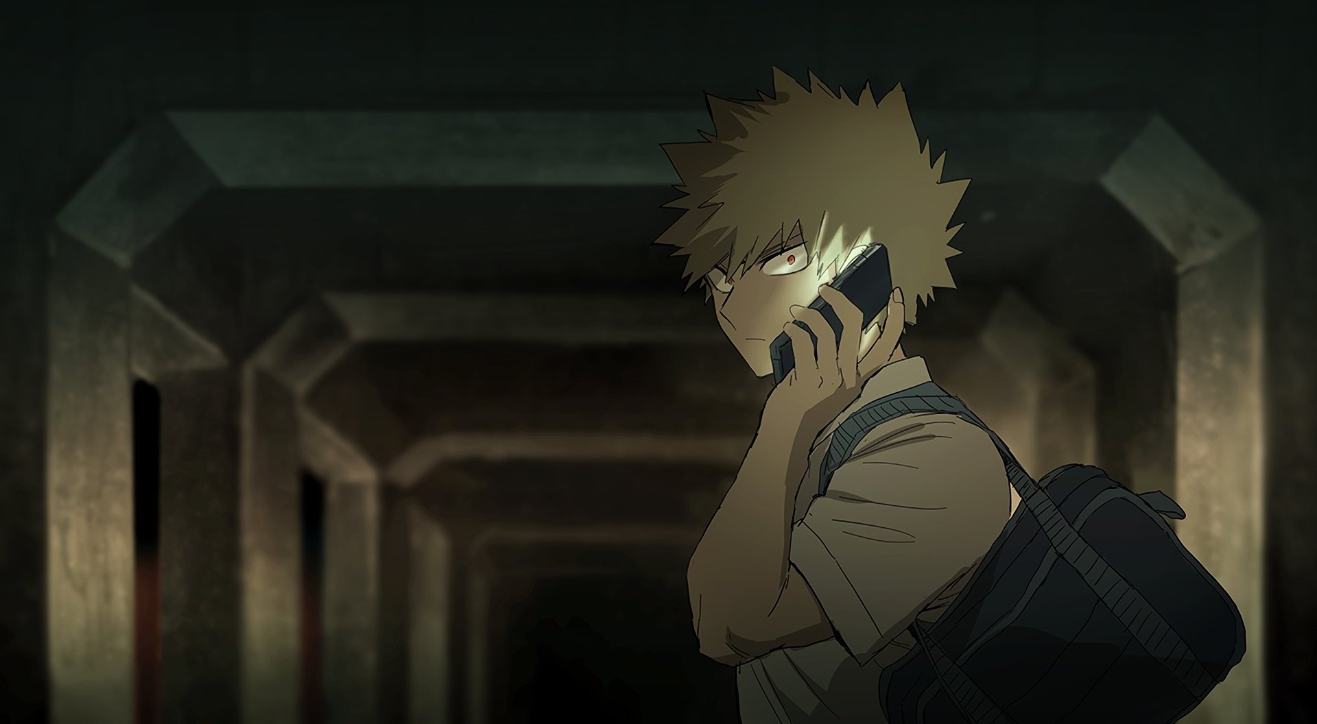 HD PC desktop wallpaper featuring Katsuki Bakugou from the anime My Hero Academia, depicted holding a phone in a dimly lit, industrial-looking setting.