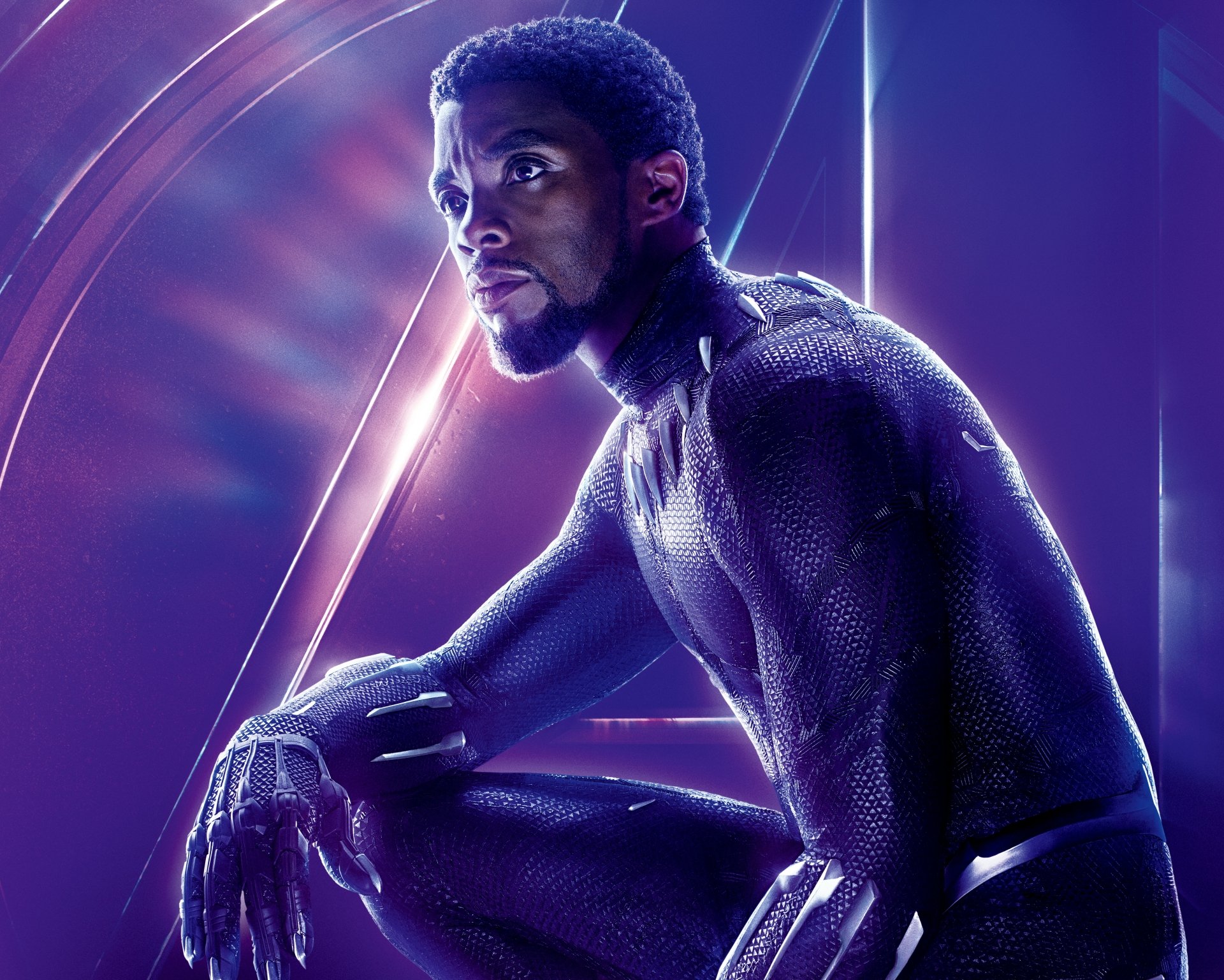 HD desktop wallpaper of Chadwick Boseman as Black Panther in the movie Avengers: Infinity War, featuring a dynamic pose with a purple and blue background.