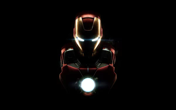 4K Ultra HD PC desktop wallpaper featuring Iron Man from the movie, showcasing his glowing arc reactor and illuminated eyes against a dark background.